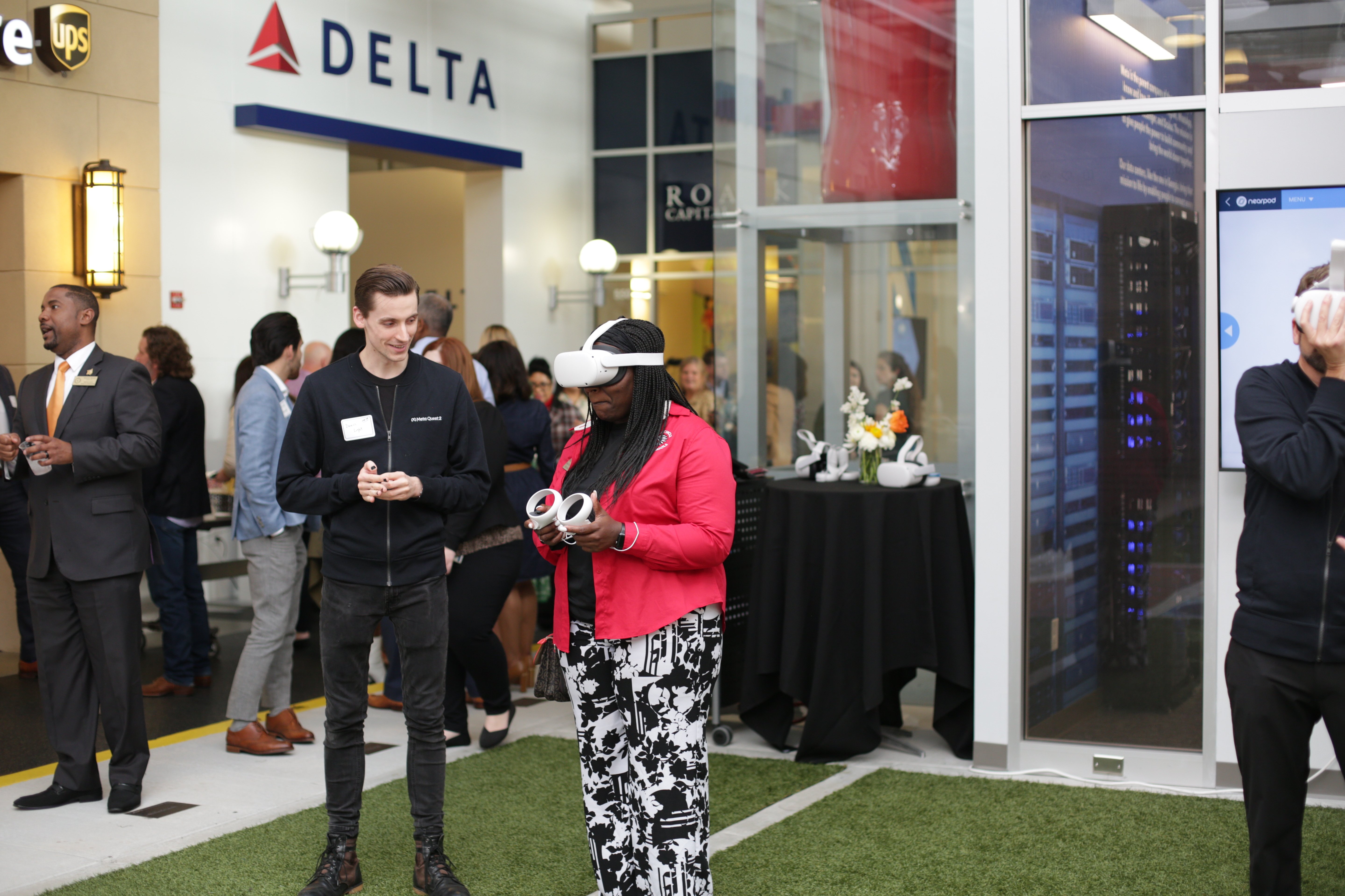 Participants using AR/VR technology during an immersive event held by Delta and executed by WITS.