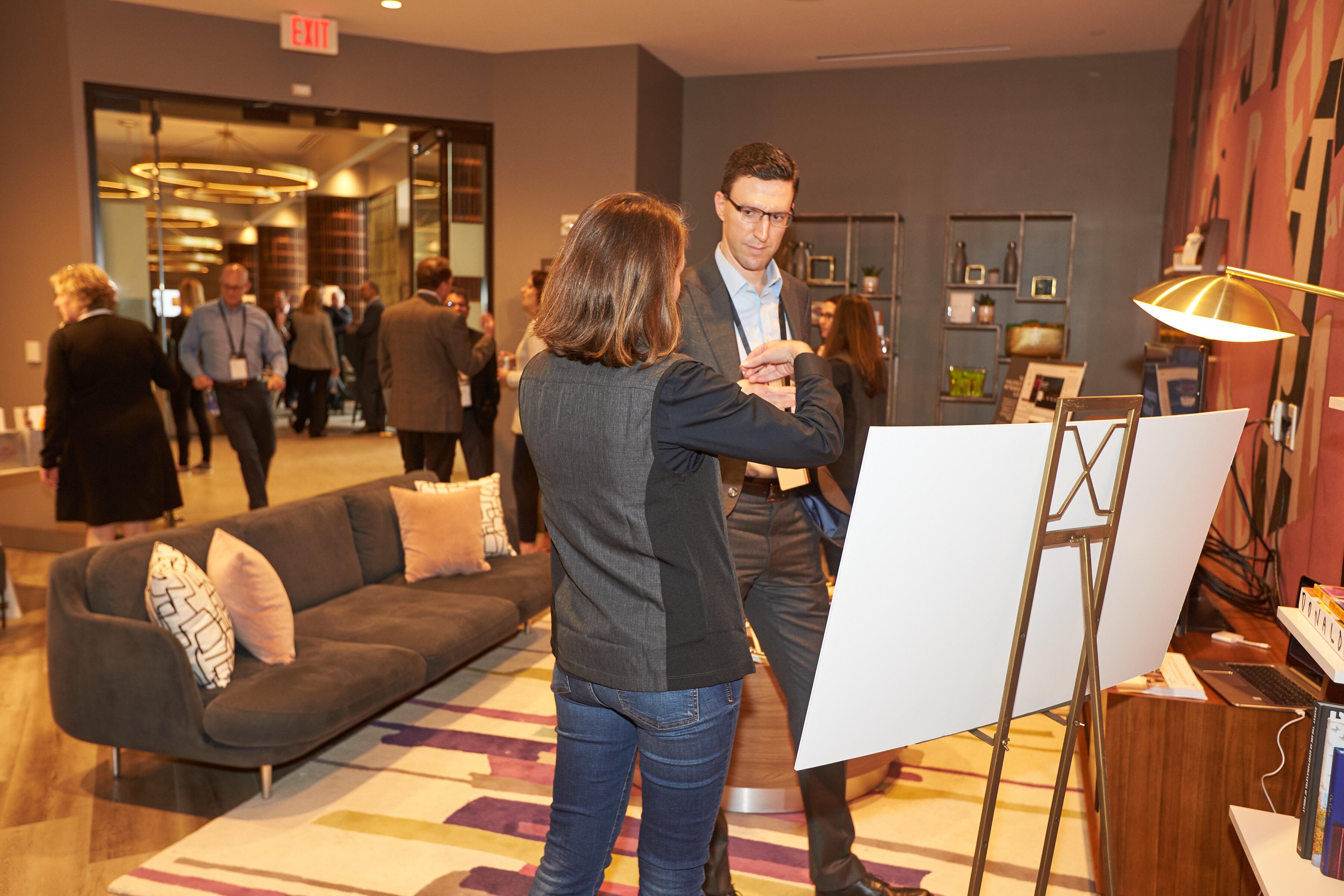 Two participants talking during Crowne Plaza corporate event meeting  